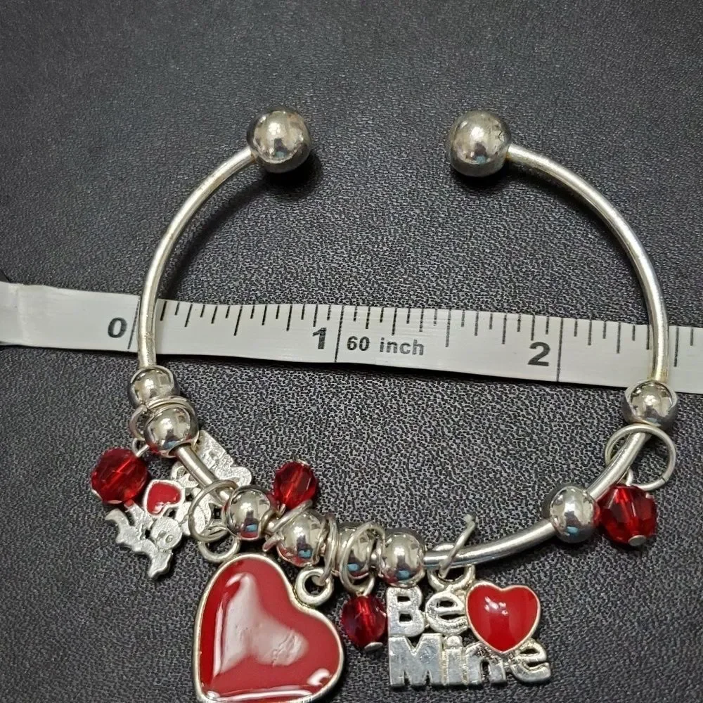 Child's silver tone valentine bracelet 6